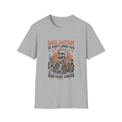T-Shirt — "Rock Bottom Is Cozy Once You Add Fairy Lights" Skeleton Graphic Tee