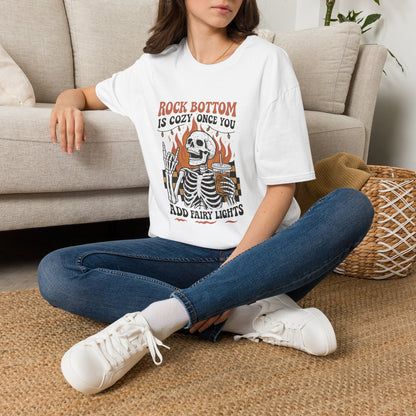 T-Shirt — "Rock Bottom Is Cozy Once You Add Fairy Lights" Skeleton Graphic Tee
