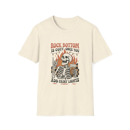 T-Shirt — "Rock Bottom Is Cozy Once You Add Fairy Lights" Skeleton Graphic Tee